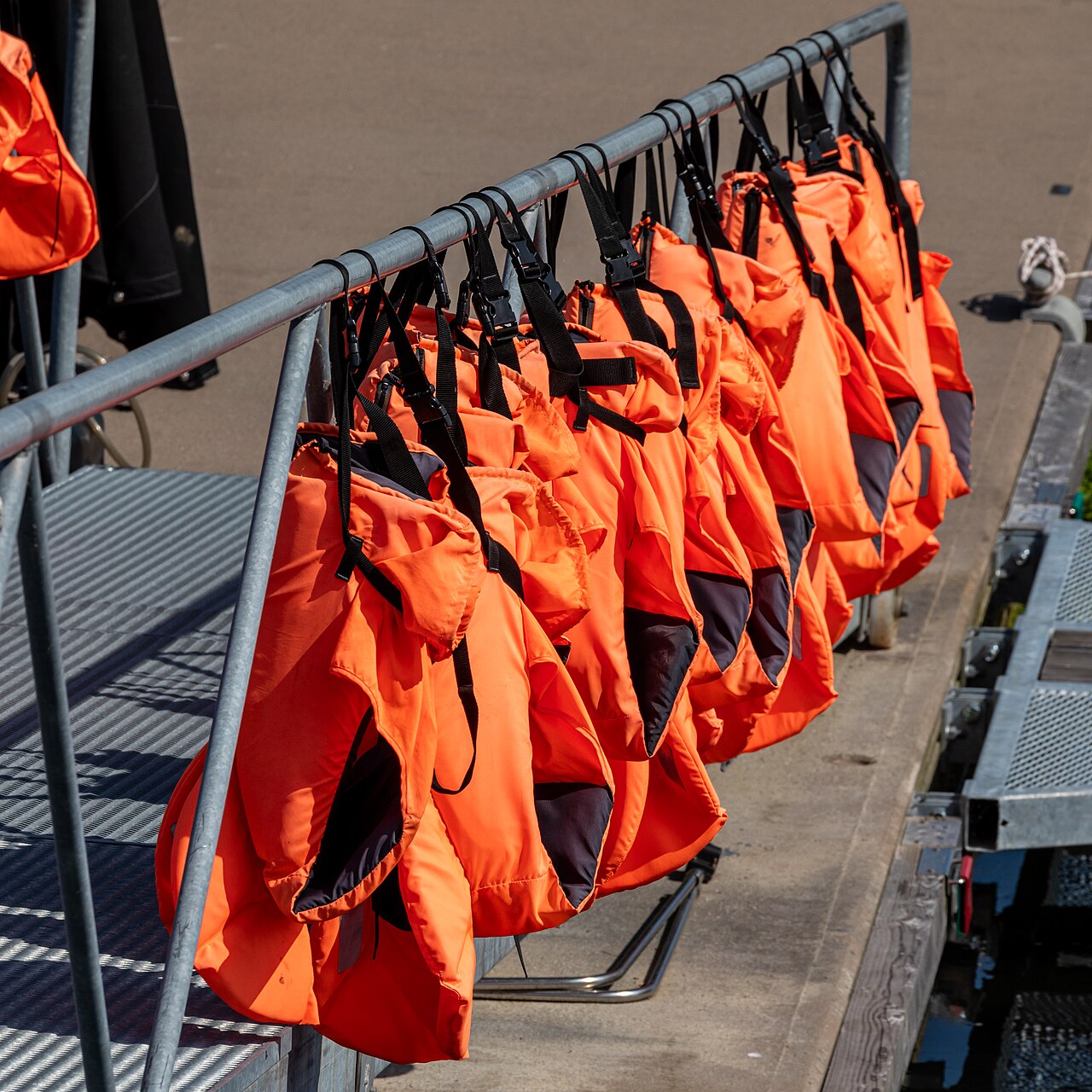 Life jackets ready for a beginner sailing safety drill