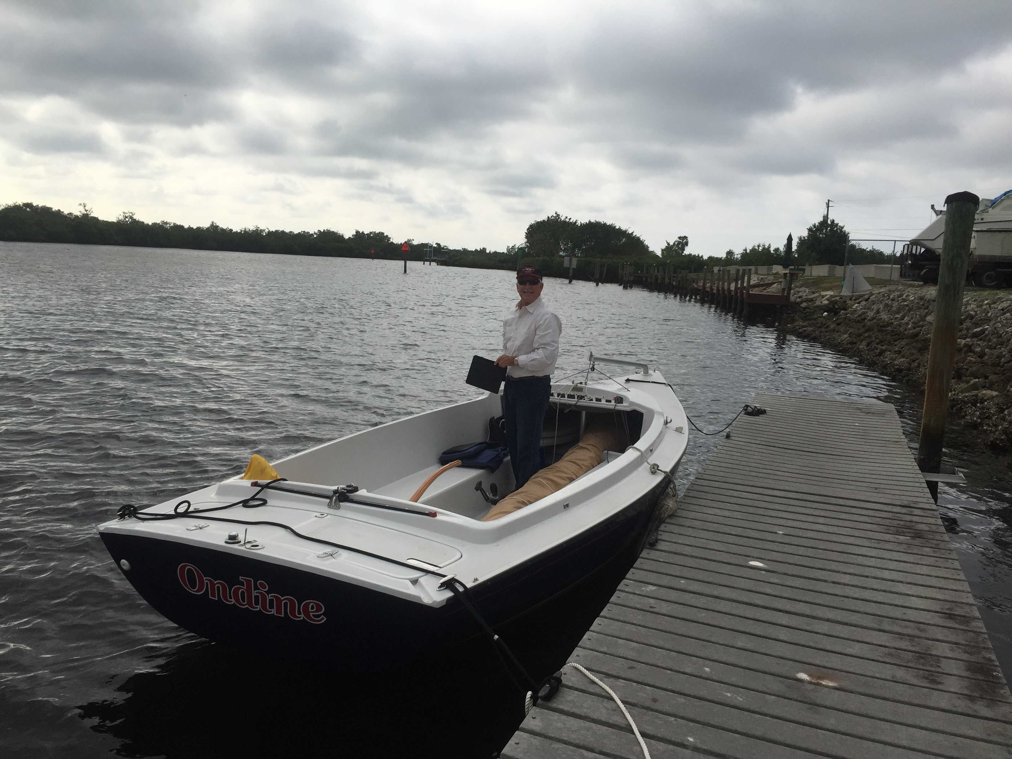 Sailing club members gathered together on a boat