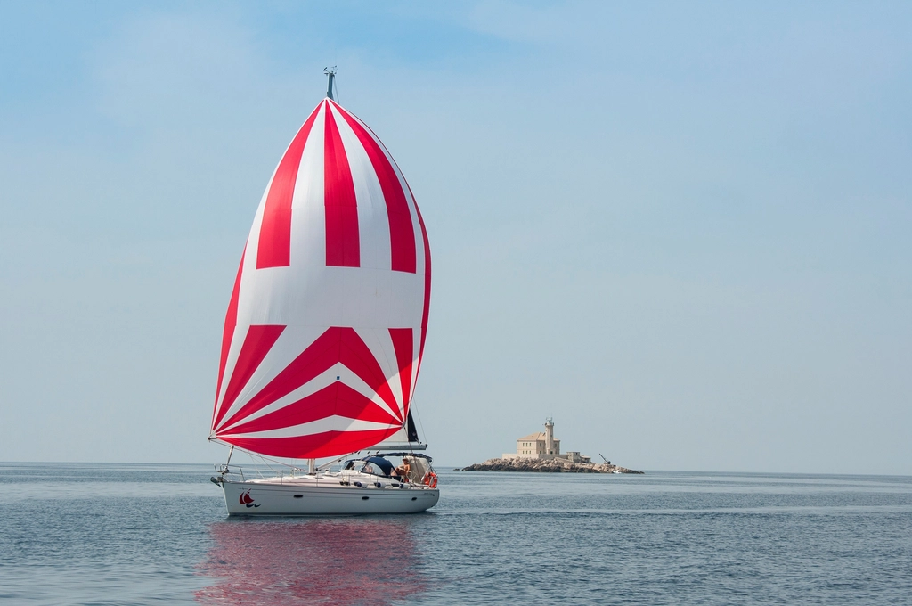 Sailing yacht crossing open blue water