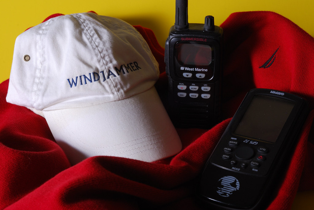 Sailing jacket with handheld VHF radio and GPS accessories arranged together